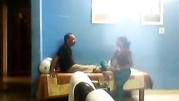 Sexy couple having a great fun in hotel room