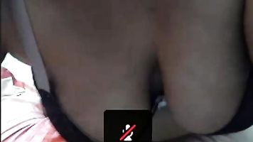 Indian big boob milf on webcam teasing live chatter showing off her delicious milk tanks.