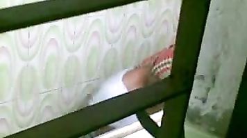Bangladeshi college babe Deepa Magi in shower filmed by her cousin visiting them using his mobile cam from bathroom roof!. video2porn2