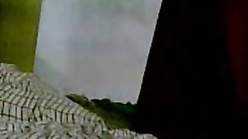 Bangladeshi housewife lying on her stomach and her hubby caressing her big round ass cheeks and playing her boobs and nipples during foreplay and fucked in missionary position.