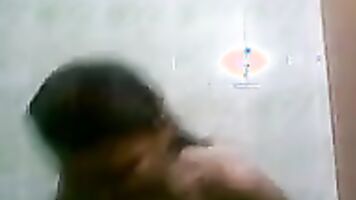 Indian teen takes a shower and gets dressed.