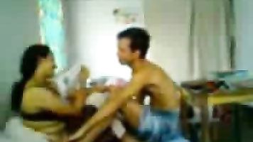 Hot mature couple enjoying sex in their bedroom.