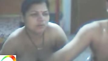 Mature bihari couple enjoying sex on cam.