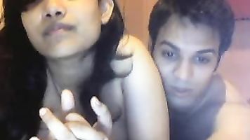 Sexy mature housewife from Assam with big milky boobs pressed while she gives h
